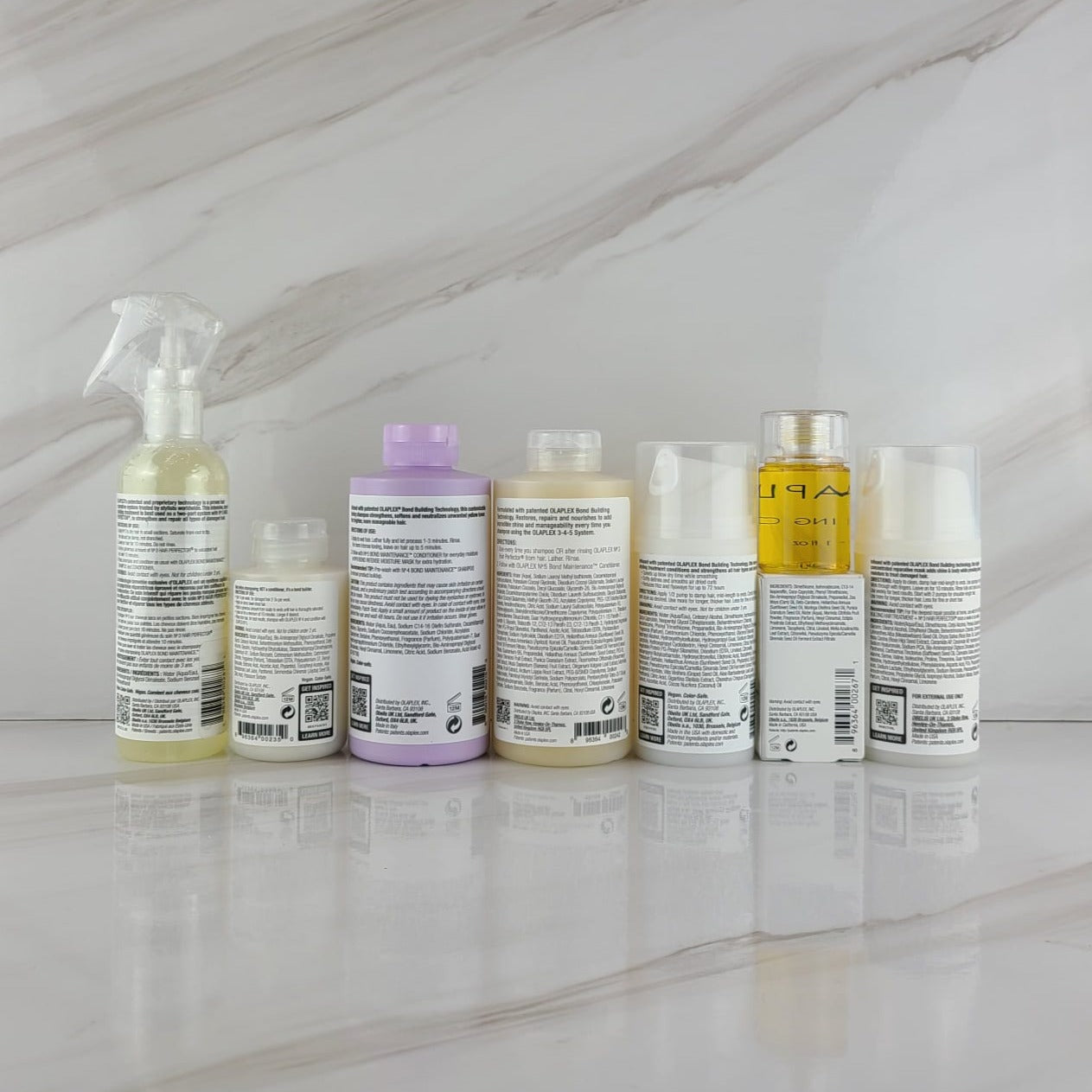 OLAPLEX No. 0, 3, 4P, 4, 6, 7 y 8 TRATAMIENTO PARA EL CABELLO Juego de 7 piezas